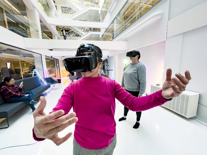 People use virtual reality headsets. - N2 Albiino / Helsinki Partners