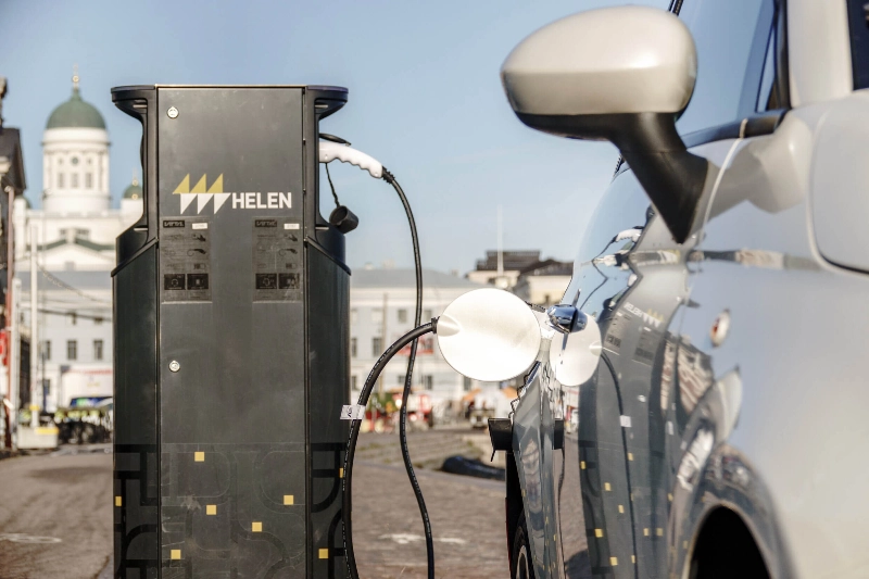 An electric car charging at a city gas station. - Maija Astikainen / Helsinki Partners