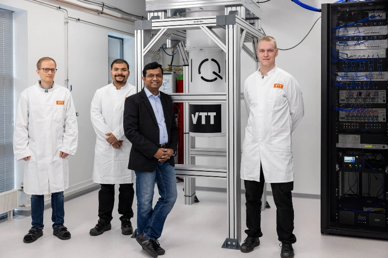 Finnish scientists stand in front of Finland’s first commerical 54-qubit quantum computer. - VTT